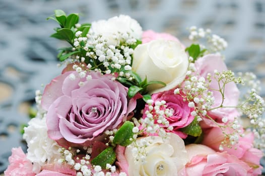 Bride pink and white rose bouquet before wedding