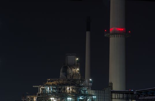 Oil refinery plant at dusk, power station