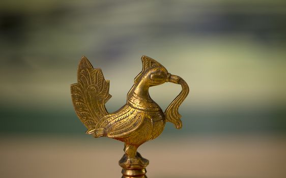 Close up photo of a traditional indian oil lamp