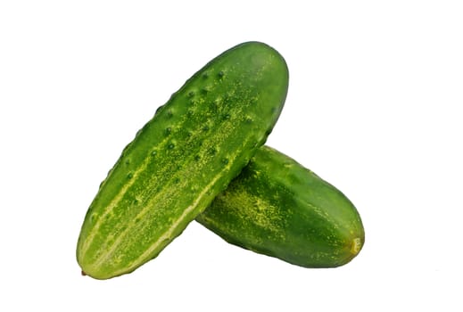 Organic cucumbers on a white background.