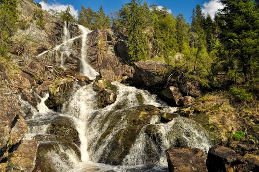 Picturesque view of the waterfall on the borderline between Sweden and Norway 