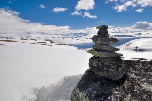 Tower made on rocks on a mossy mountain in Norway