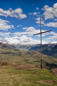 Cross over Mestia with mountains in the background, Georgia