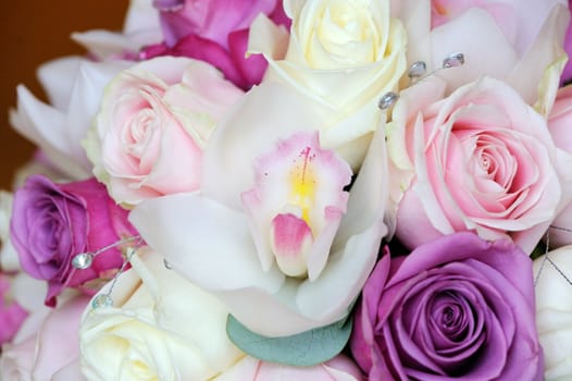 Brides beautiful flowers with orchid and roses