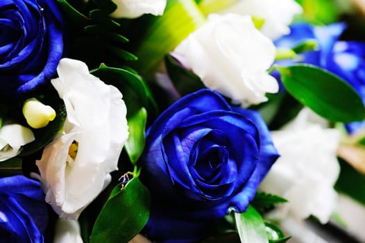 Brides bunch of blue roses on wedding day
