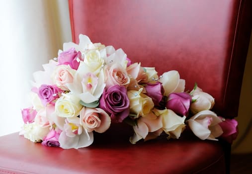 Brides purple and pink roses and orchid