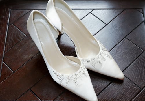Brides shoes closeup on wedding day