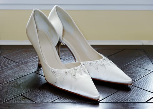 Brides white shoes closeup details