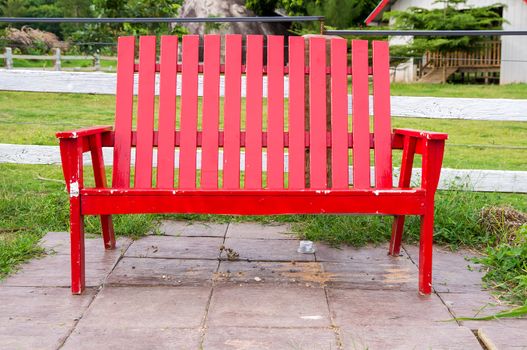 Red bench in garden