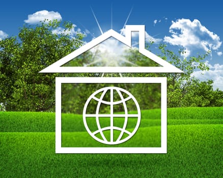 House icon with globe. Green grass and blue sky as backdrop