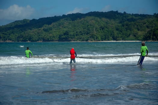 Pangandaran, Indonesia - July 16, 2011: Fisherman at Pangandaran beach, West Java-Indonesia.