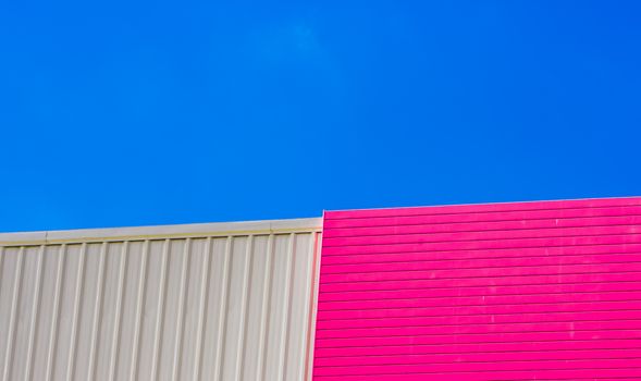 Colorful wall and blue sky.