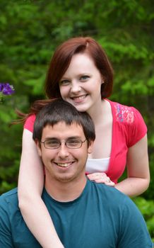 Young engaged couple enjoying summer day