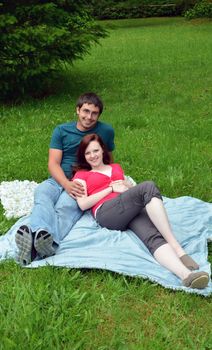 Young engaged couple enjoying summer day