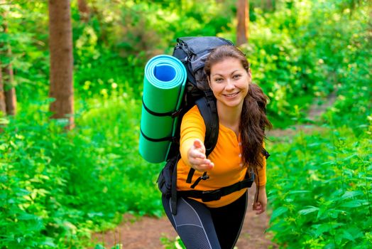 portrait of a happy tourist in a hike