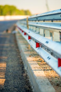 macro fence road at dawn