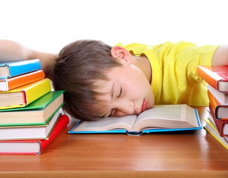 Tired Kid Sleeping on the School Desk on the white background