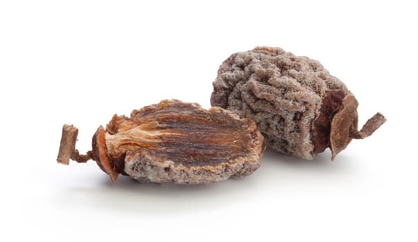 Some isolated dried persimmons on the white background