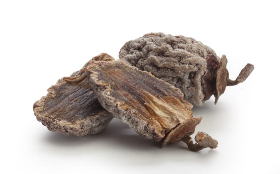 Some isolated dried persimmons on the white background