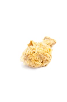 Fried chicken placed on a white background taken in the studio.