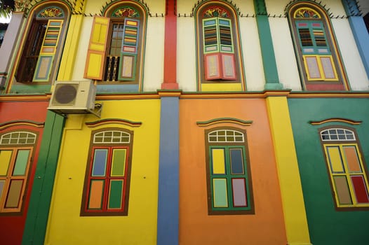 Color shutters and color facade of building in Little India, Singapore
