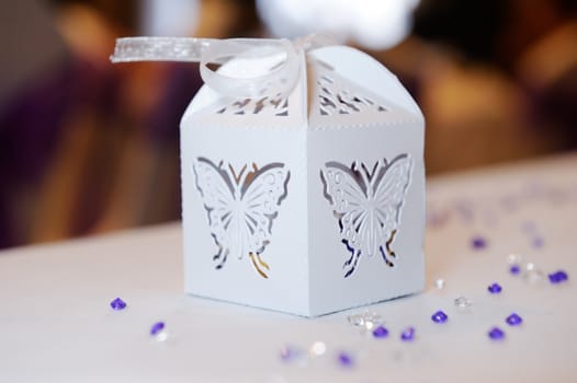 Decorative gift box at wedding reception with butterfly detail