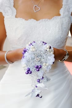 Closeup of brides unusual bouquet on wedding day