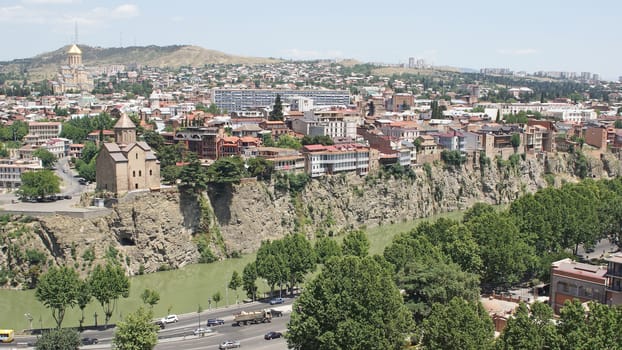 TBILISI, GEORGIA - JUNE 28, 2014: Panorama of Tbilisi with Trinity Church and Metechi Church on June 28, 2014 in Georgia, Europe