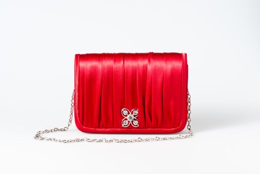 Woman little red purse on white background