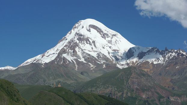 Mount Kazbek with monastery Zminda Sameba, Stepantsminda, Georgia, Europe