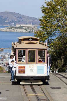 SAN FRANCISCO - NOVEMBER 2nd: The Cable car tram, November 2nd, 2012 in San Francisco, USA. The San Francisco cable car system is world last permanently manually operated cable car system. Lines were established between 1873 and 1890.