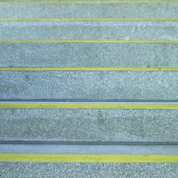 Concrete steps with yellow lines