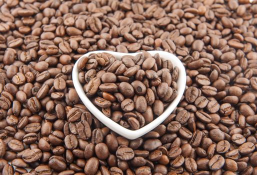 Heart shaped cup, put on the coffee beans.