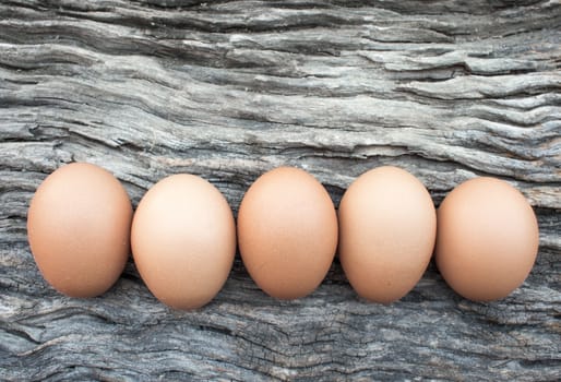 Eggs laid on wooden floor