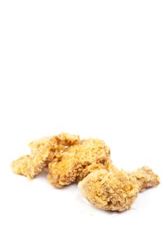 Fried chicken placed on a white background taken in the studio.