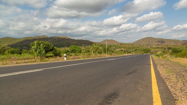 The road from Harar to Jigjiga cutting through a beautiful landscape surrounded by mountains