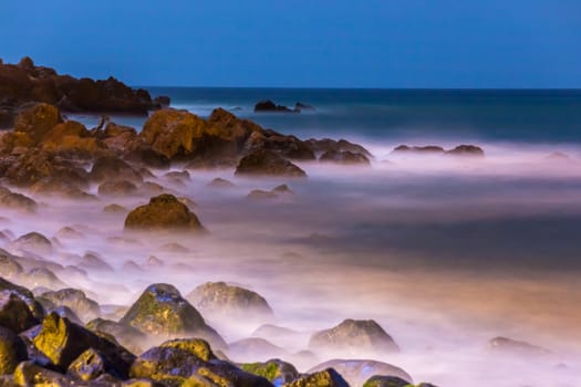 The beautiful waters of the Atlantic ocean with its rocky coastline near the City of Dakar in Senegal