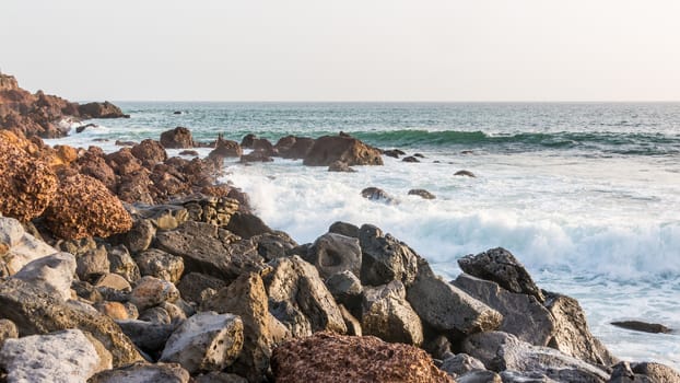 The beautiful waters of the Atlantic ocean with its rocky coastline near the City of Dakar in Senegal