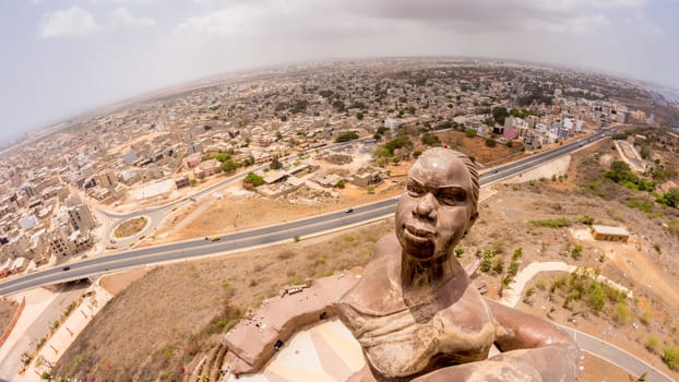 African Renaissance Monument, a 49 meter tall bronze statue of a man, woman and child, in Dakar, Senegal