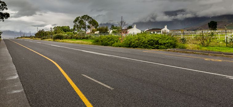 Highway cutting through the picturesque landscapes of the Western Cape regions of South Africa