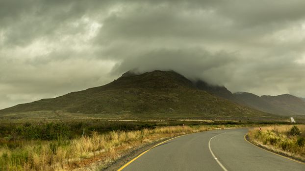 Highway cutting through the picturesque landscapes of the Western Cape regions of South Africa