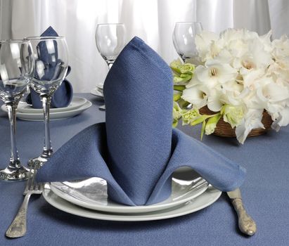 Fragment table setting decorated with flower napkin