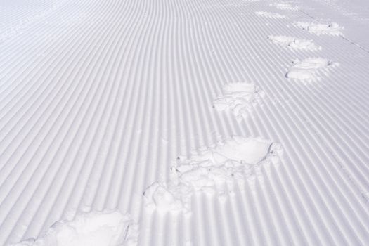 Footsteps on the snow at Falls Creek snow trip Australia