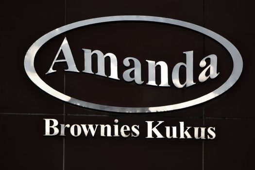 bandung, indonesia-july 29, 2014: amanda brownies logo. amanda brownies is one of famous cake factory within brownies speciality from bandung, west java-indonesia.