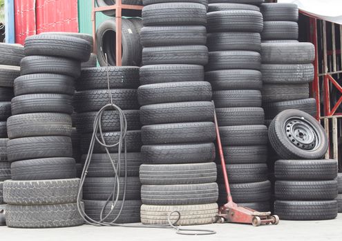 Pile of old car tires  in industrial