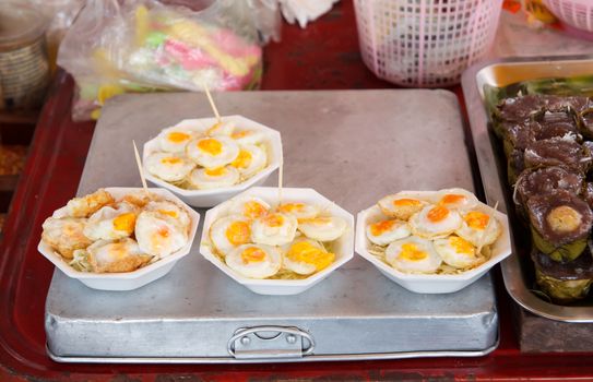 fried egg in foam plate (thai street food)