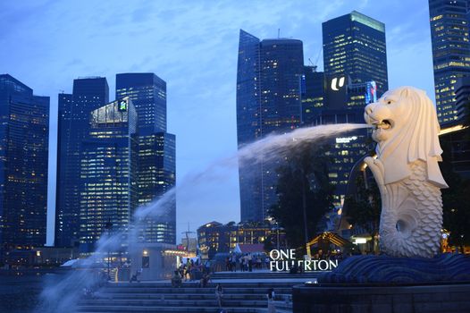 SINGAPORE-Apr 30:Th e Merlion fountain Apr 30, 2012 in Singapore.Merlion is a mythical creature with the head of a lion and the body of a fish,and is a symbol of Singapore.