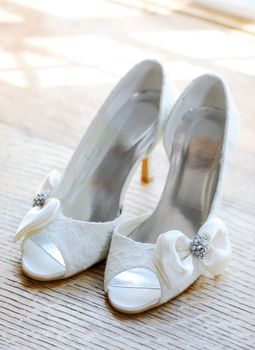 Brides white shoes on wedding day