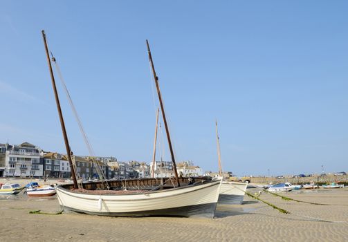 Traditional English fishing boats in St Ives Cornwall on a sunny summer day
