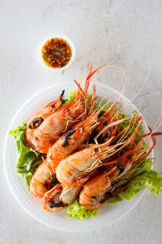 Top view grilled prawns with seafood sauce